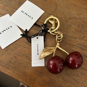 Coach Red Cherry purse charmwith Gold Details